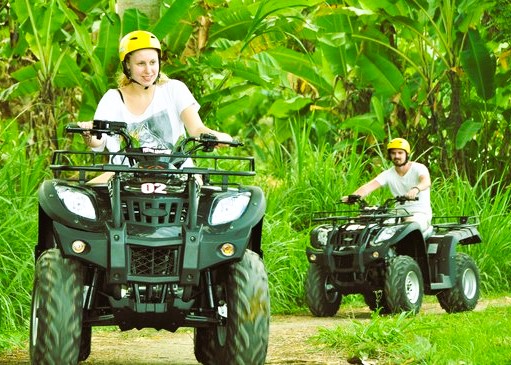 Riders on quad bikes exploring Zanzibar