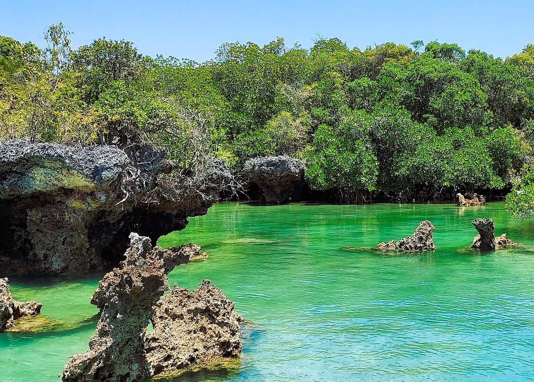 Relaxing on pristine white sandy beaches during Safar Blue Tour